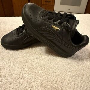 Puma Black Leather GV Special Sneakers with Gold Logo